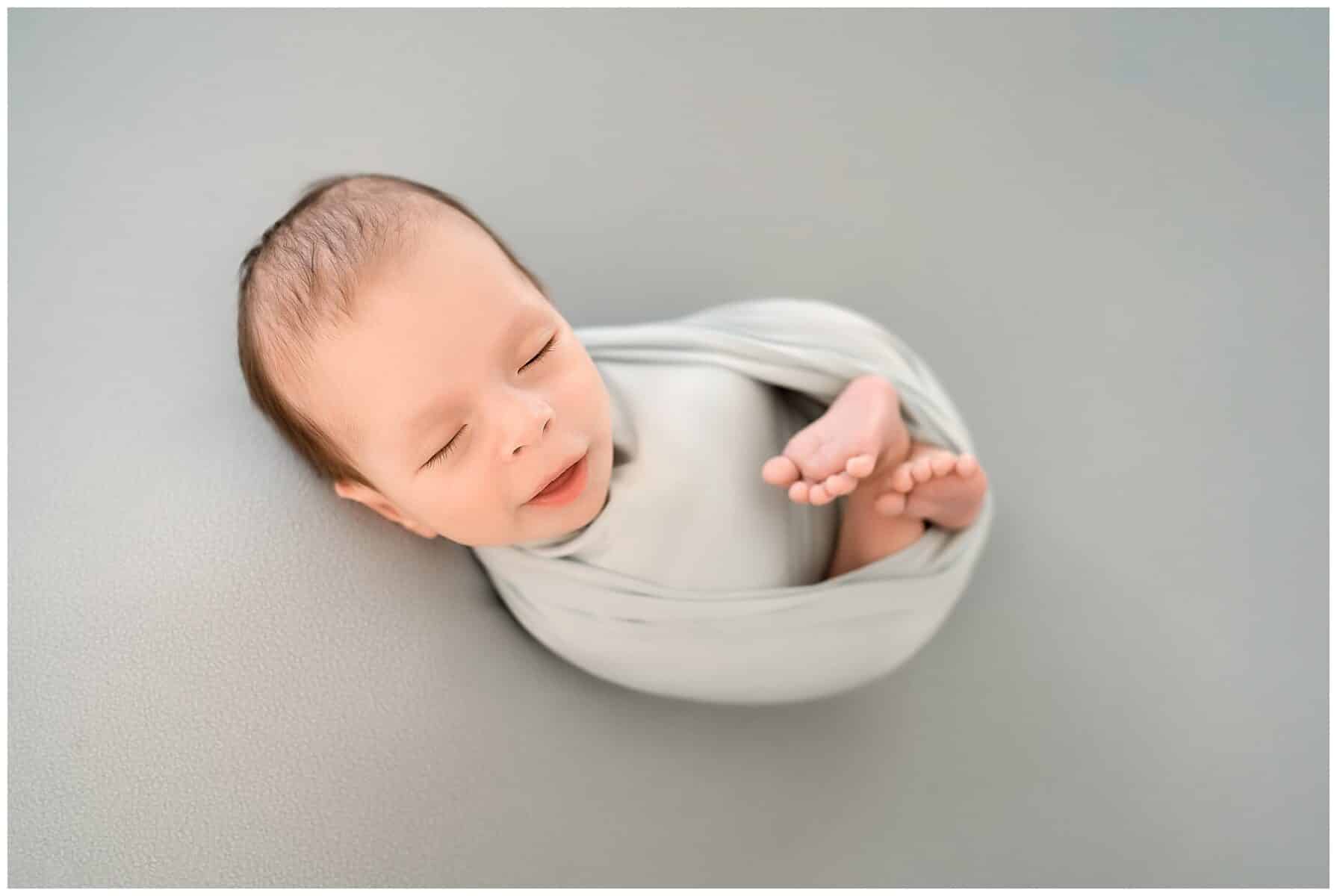 Newborn smiling during Austin photoshoot